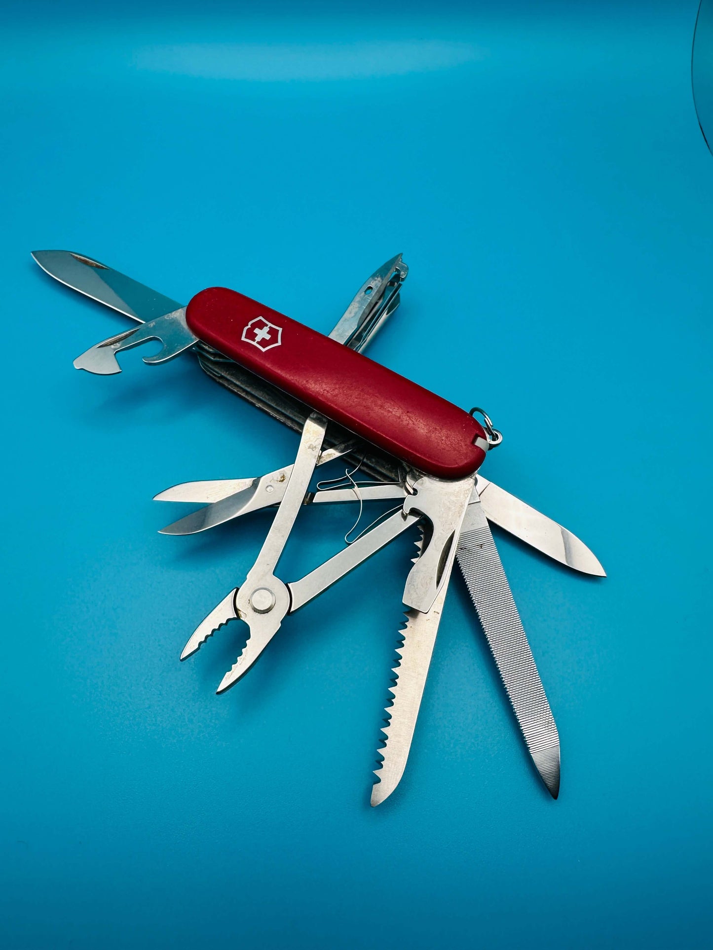 Used Victorinox Craftsman multi-tool knife – scissors and blade visible