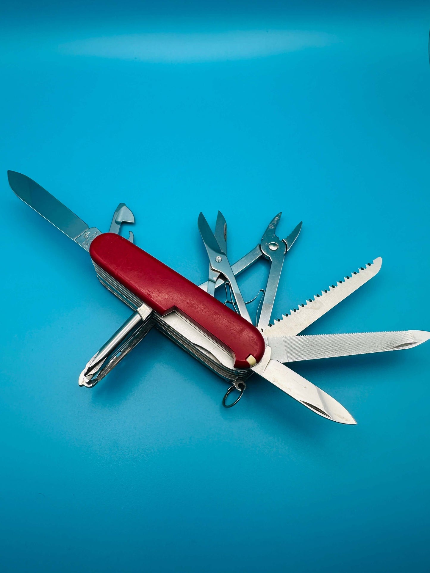Close-up of Craftsman Swiss Army Knife with saw, screwdriver, and opener