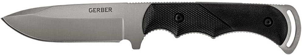 Side view of Gerber Freeman Guide full tang hunting knife outdoors on rock surface