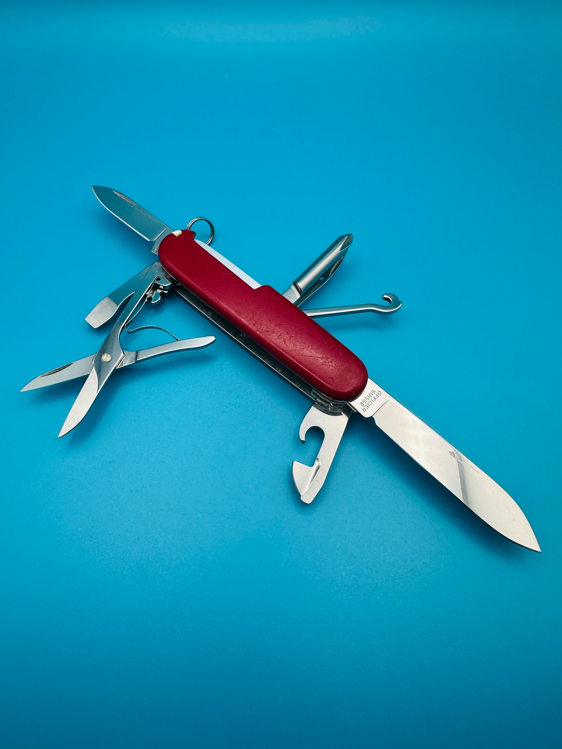 Victorinox knife with tools partially unfolded for display