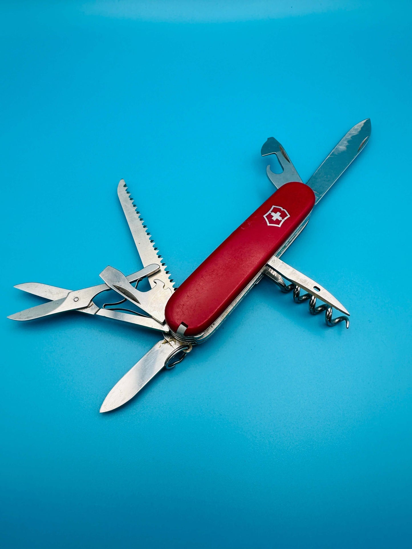 Pre-owned Swiss Army Knife Huntsman model – red handle, main blade open