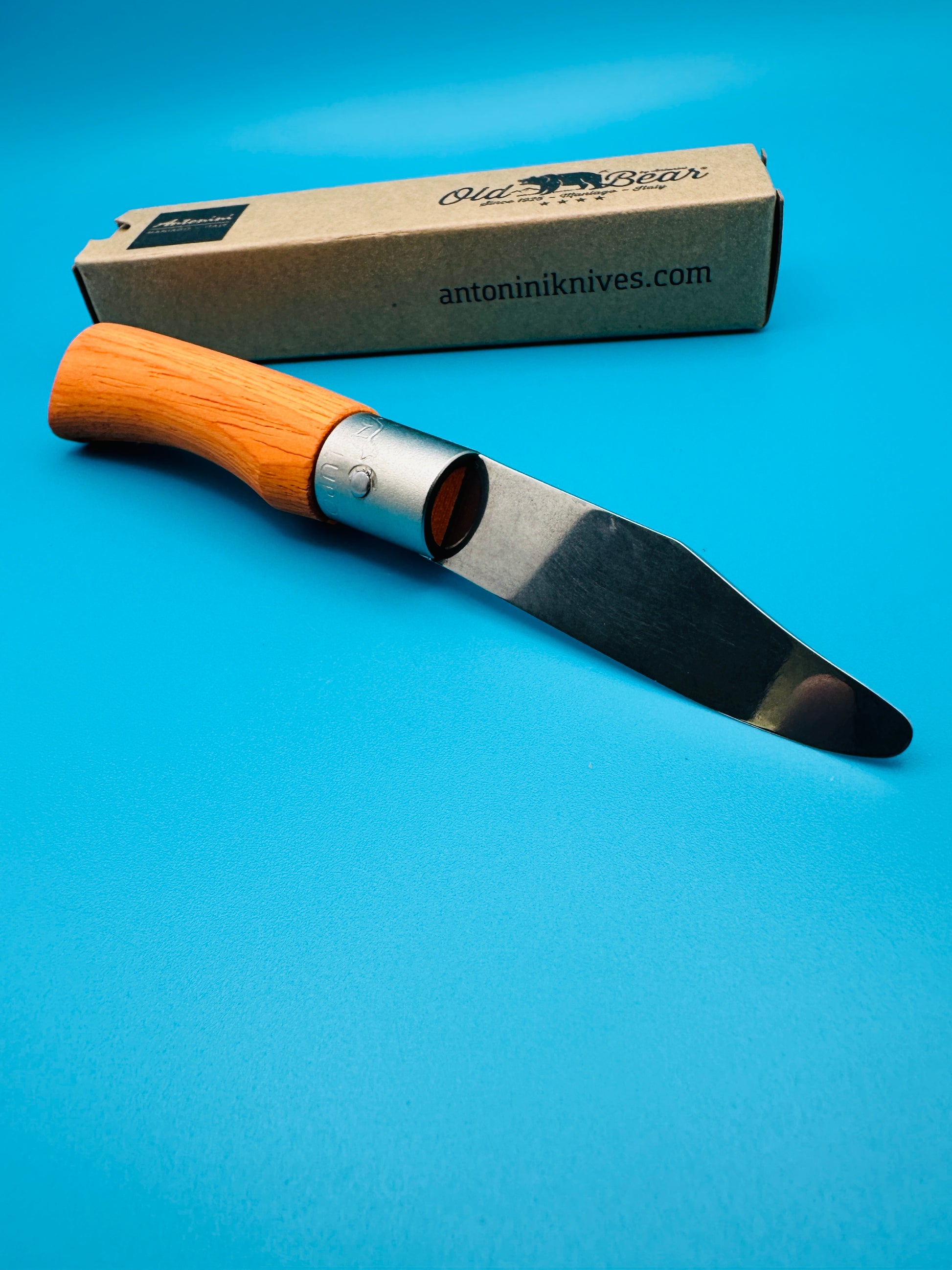 Orange painted wooden handle – detailed texture view